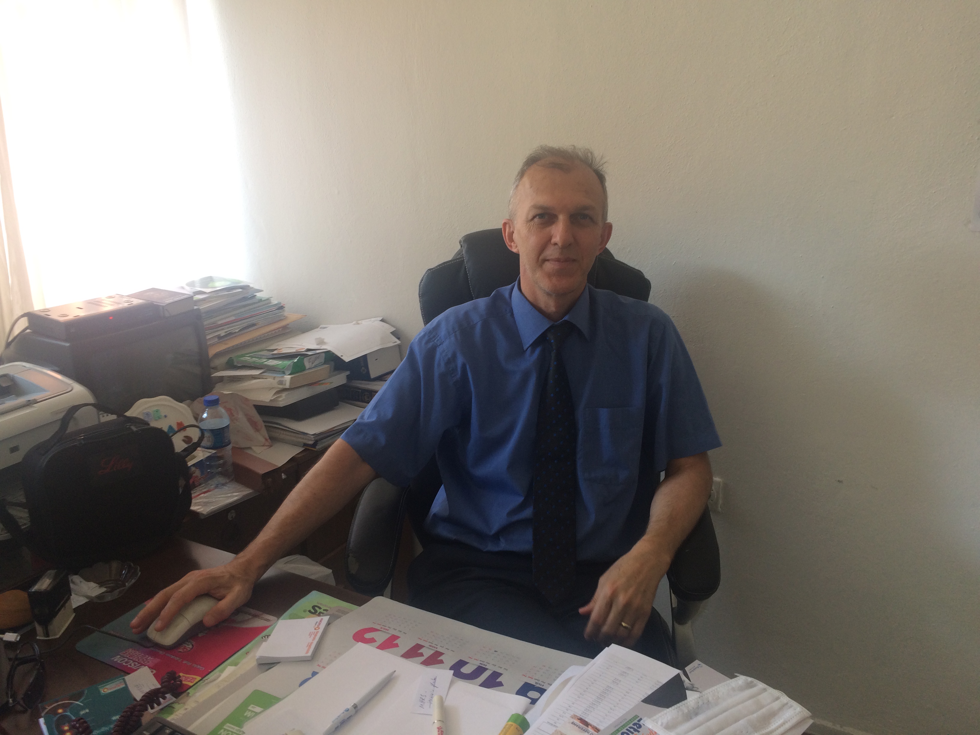 Dr. Erkan LELOGLU